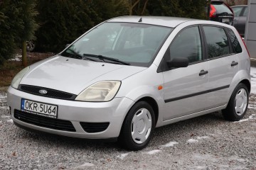 Klimatyzacja , Elektryczne szyby , Radio